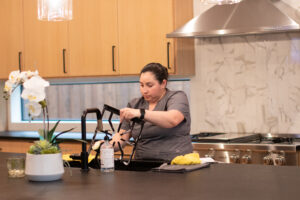 Vella professional cleaning countertop in pantry area