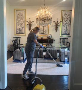 Vella’s staff vacuumed the dining room floor.